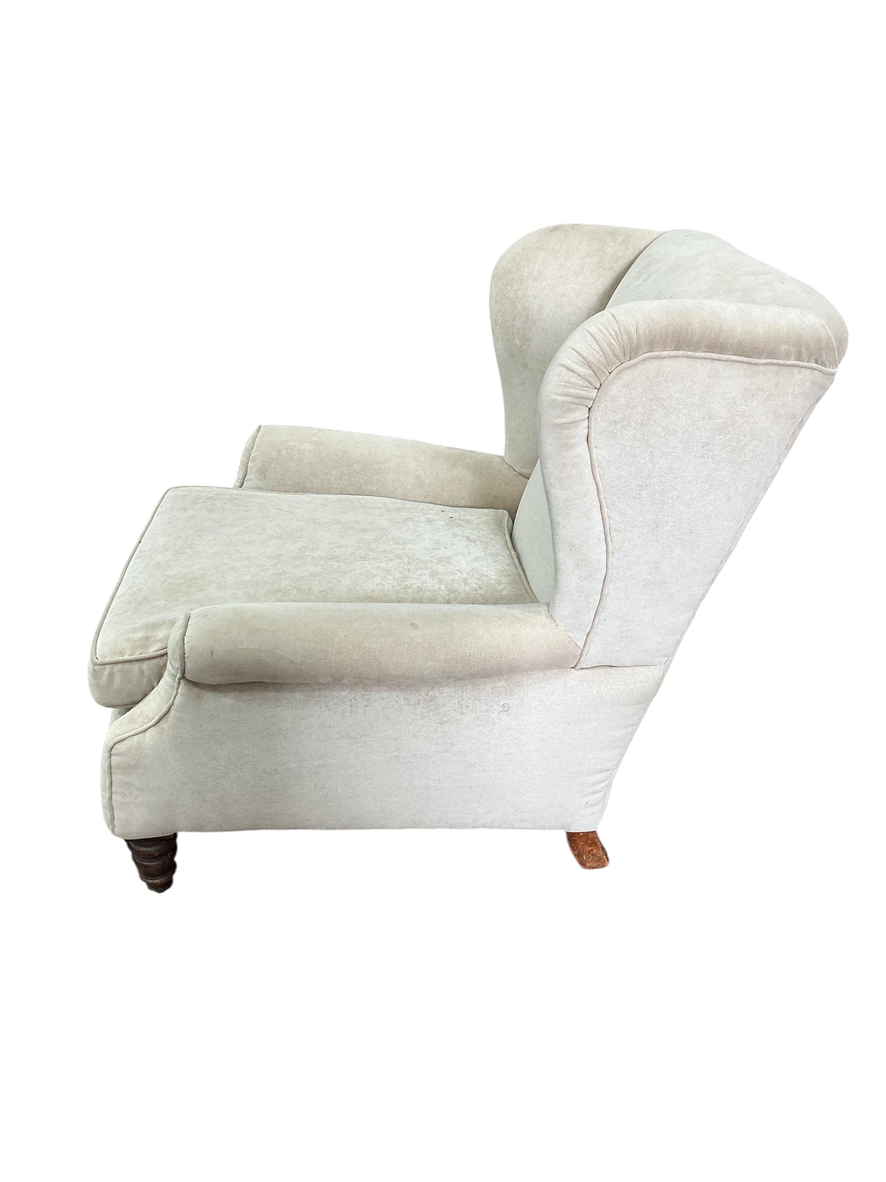 A Victorian upholstered wing armchair, width 80cm, depth 84cm, height 84cm